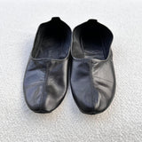 leather slippers in black color